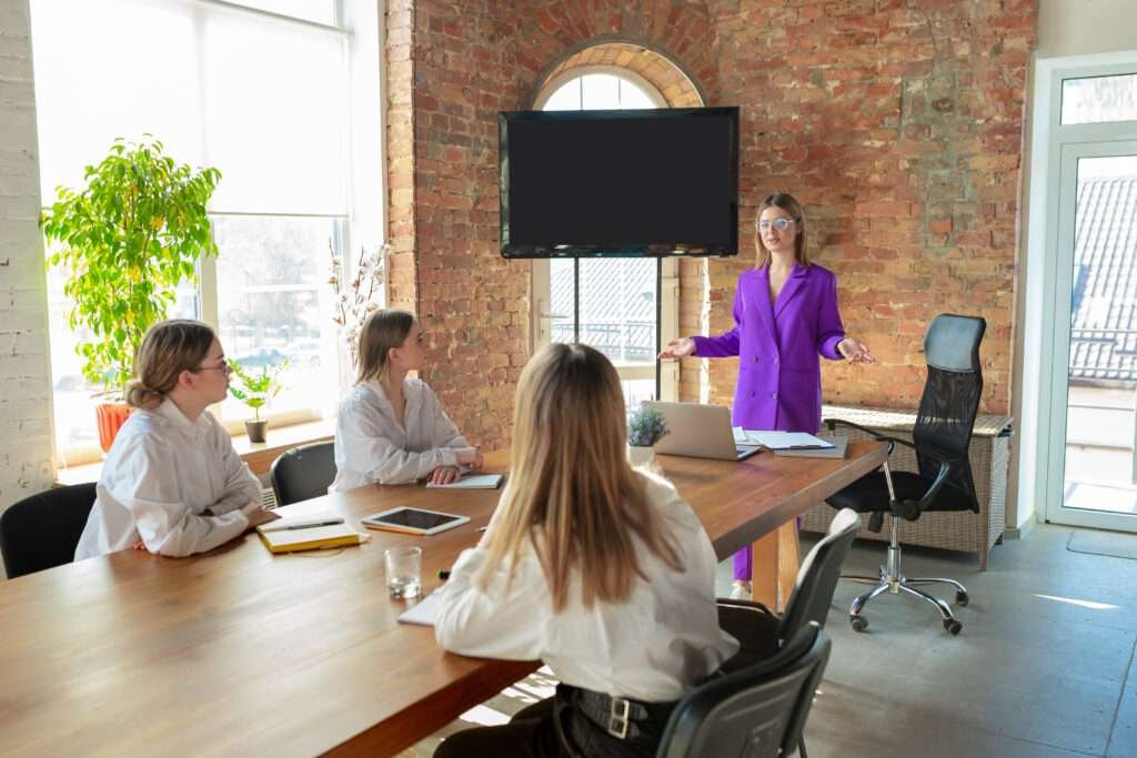 modern young caucasian business woman modern office with team meeting tasks giving women front office working concept finance business girl power inclusion diversity feminism